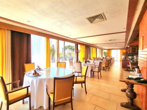 Ein Restaurant oder anderes Speiselokal in der Unterkunft Hotel El Araucano 