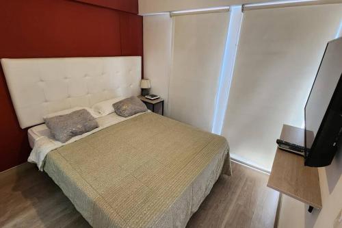 Katil atau katil-katil dalam bilik di 3 Departamento en Barranco, ¡Excelente Terraza!