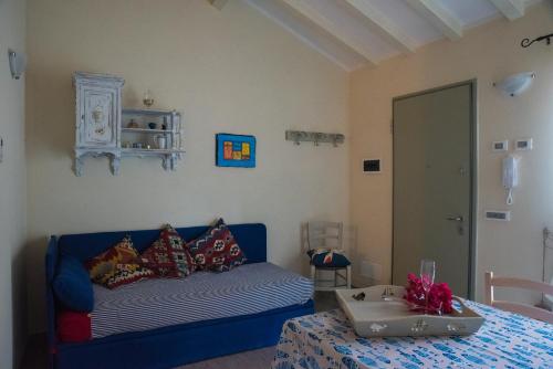 Ένα ή περισσότερα κρεβάτια σε δωμάτιο στο Villa Caterina