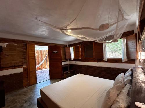 Ein Bett oder Betten in einem Zimmer der Unterkunft Casa Gaviota