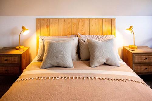 Un pat sau paturi într-o cameră la Doeling Barcombe