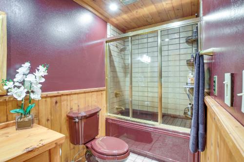 a bathroom with a toilet and a shower at Family Home with Indoor Pool about 2 Mi to Elkhart Lake! in Elkhart Lake