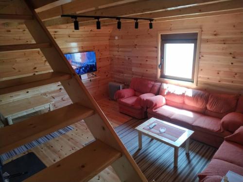 an overhead view of a living room in a log cabin at Brown cabin in Žabljak