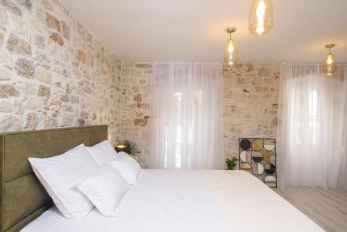 Cama o camas de una habitación en Rooms Bartul Trogir