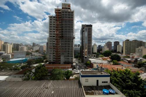 a view of a city skyline with tall buildings at BHomy Turiassu in Sao Paulo