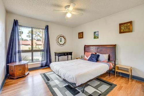 a bedroom with a large bed and a window at WFH-Friendly Las Vegas Condo 2 Mi to Strip! in Las Vegas