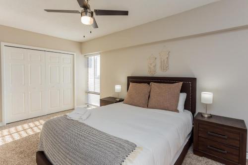 a bedroom with a large bed and a ceiling fan at Bargain Memphis apartment w HDTV & WiFi in Memphis