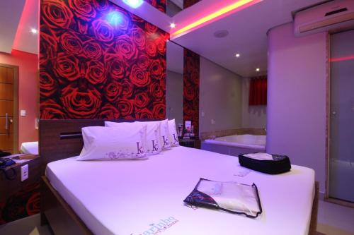 Katil atau katil-katil dalam bilik di Karinho Hotel 4