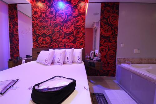 Katil atau katil-katil dalam bilik di Karinho Hotel 4