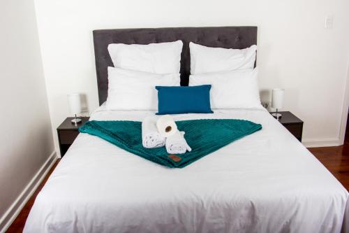 Katil atau katil-katil dalam bilik di Botha Villa Lodge Goodwood