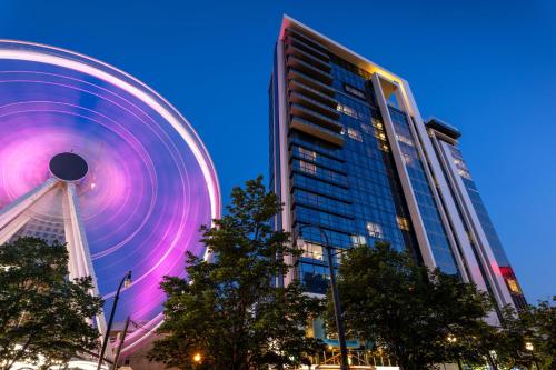 a large building with a large wheel in front of it at Margaritaville Vacation Club - Atlanta in Atlanta