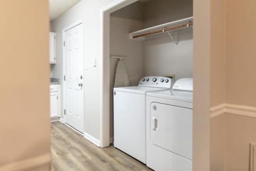 a laundry room with a washer and dryer at Chapel Hill Charmer- Close to Interstates in Indianapolis