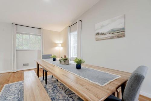 a dining room with a table and two chairs at Mins to USC, Hospital, Zoo! Columbia Duet- 2 Units in West Columbia