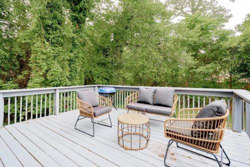 a deck with chairs and a couch and a grill at Mins to USC, Hospital, Zoo! Columbia Duet- 2 Units in West Columbia