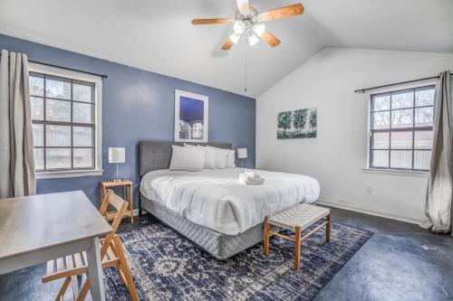 a bedroom with a bed and a ceiling fan at Near Shelby Farms & Greenline- Cordova Comfort in Memphis