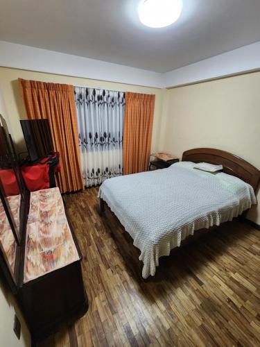 Hospedaje Chavez tesisinde bir odada yatak veya yataklar