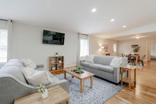 a living room with two couches and a table at Mins to USC Hospital Zoo Columbia Duet-Unit B in West Columbia