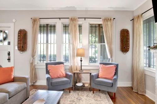 a living room with two chairs and a couch at Charming Midtown Apt - Hannon Hideaway Unit C in Mobile