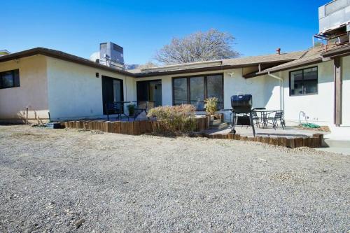 a house with a gravel driveway in front of it at Oakridge Ranch ※ Sequoia, Kern River & Lake Escape in Lake Isabella