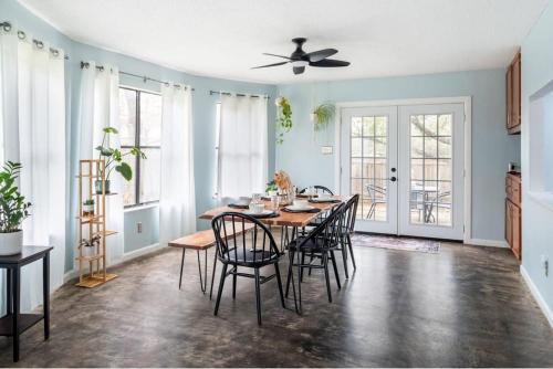 a dining room with a table and chairs at Pet-Friendly Southwest Austin Home with BBQ in Austin