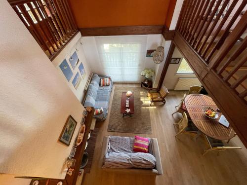 an overhead view of a living room with a couch at Appartement Arcachon, 5 pièces, 8 personnes - FR-1-420-130 in Arcachon
