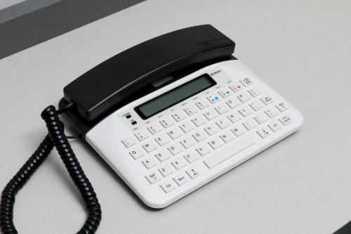 a cell phone sitting on top of a desk at avid hotel - Fresnillo by IHG in Fresnillo de González Echeverría