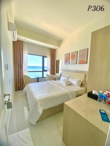 Postel nebo postele na pokoji v ubytování Island Sunset Hotel - Đảo Phú Quý