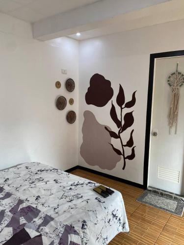 Ένα ή περισσότερα κρεβάτια σε δωμάτιο στο Moalboal Panagsama beach TopBudz Hostel