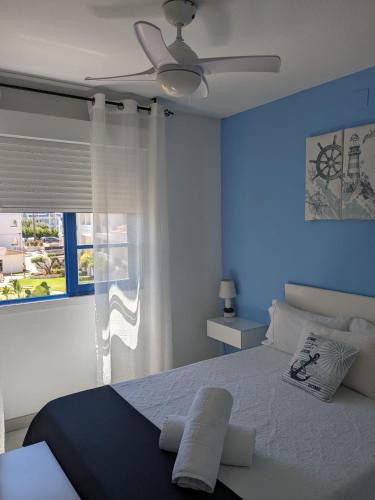 Postel nebo postele na pokoji v ubytování Apartamento enfrente la playa