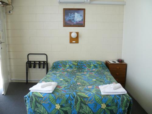 Postel nebo postele na pokoji v ubytování Norfolk Motor Inn