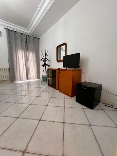 TV a/nebo společenská místnost v ubytování La casa di fili