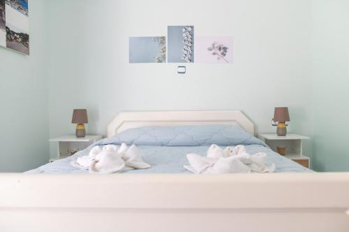 Postel nebo postele na pokoji v ubytování Kos Dream Beachwalk Apartment
