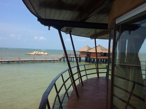a view of a pier from a boat in the water at LooLa Adventure Resort in Telukbakau