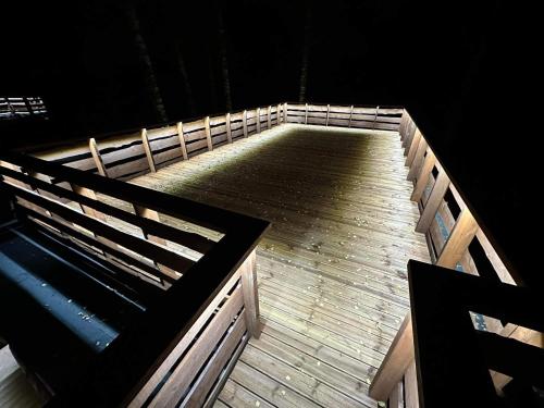 an overhead view of a wooden boardwalk at Lepikumäe Holiday Home with Sauna and Hot tub for up to 18 persons in Reina