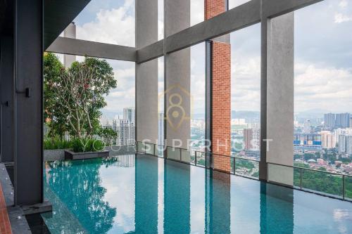 a swimming pool on the roof of a building at Millerz Square Tower E Near MidValley by YourSuperhost in Kuala Lumpur
