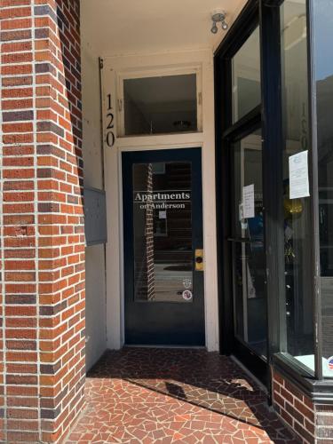 an entrance to a building with a sign on the door at Historic Hideout in Fayetteville