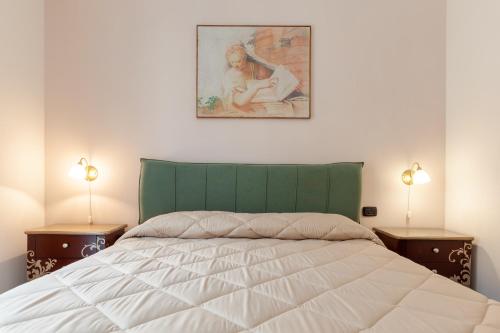 Postel nebo postele na pokoji v ubytování B&B Dimora di Girgenti