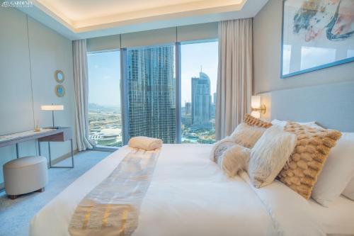 Postel nebo postele na pokoji v ubytování Address Dubai Opera, Full Burj Khalifa and Fountain View by Gardenia Suites