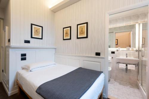 Postel nebo postele na pokoji v ubytování Hotel Silla