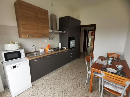 Appartamento Cliziaにあるキッチンまたは簡易キッチン