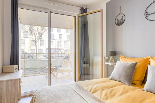 a bedroom with a large bed and a balcony at Massy Serenity - 64m2, Terrace, Balcony, Parking in Massy