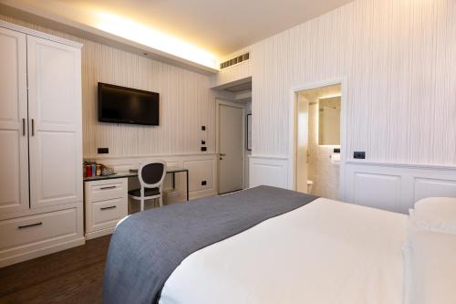Postel nebo postele na pokoji v ubytování Hotel Silla