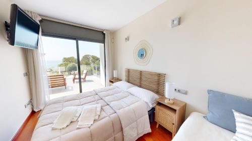 Ένα ή περισσότερα κρεβάτια σε δωμάτιο στο Villa Elena