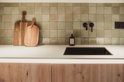 Una cocina o zona de cocina en L’exclusif