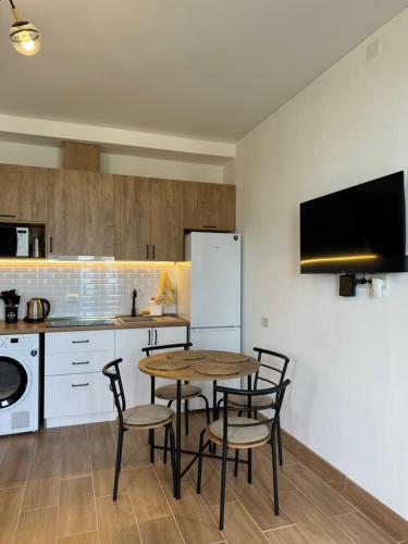Kuchyň nebo kuchyňský kout v ubytování New apartment with sea view