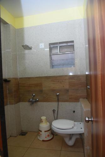 Ένα μπάνιο στο Hotel Royal Inn Mangalore - Opp SDM Law College MG Road
