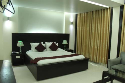 Hiltown Hotelにあるベッド