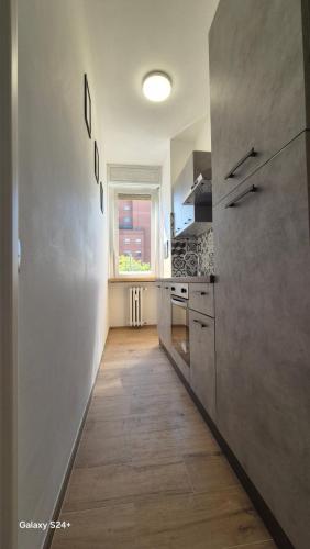 Кухня или мини-кухня в Casa vacanza Milano 104
