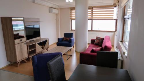 Akustik Residenceにあるテレビまたはエンターテインメントセンター