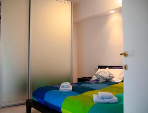 Ліжко або ліжка в номері Appartamento a Santa Margherita con terrazzo